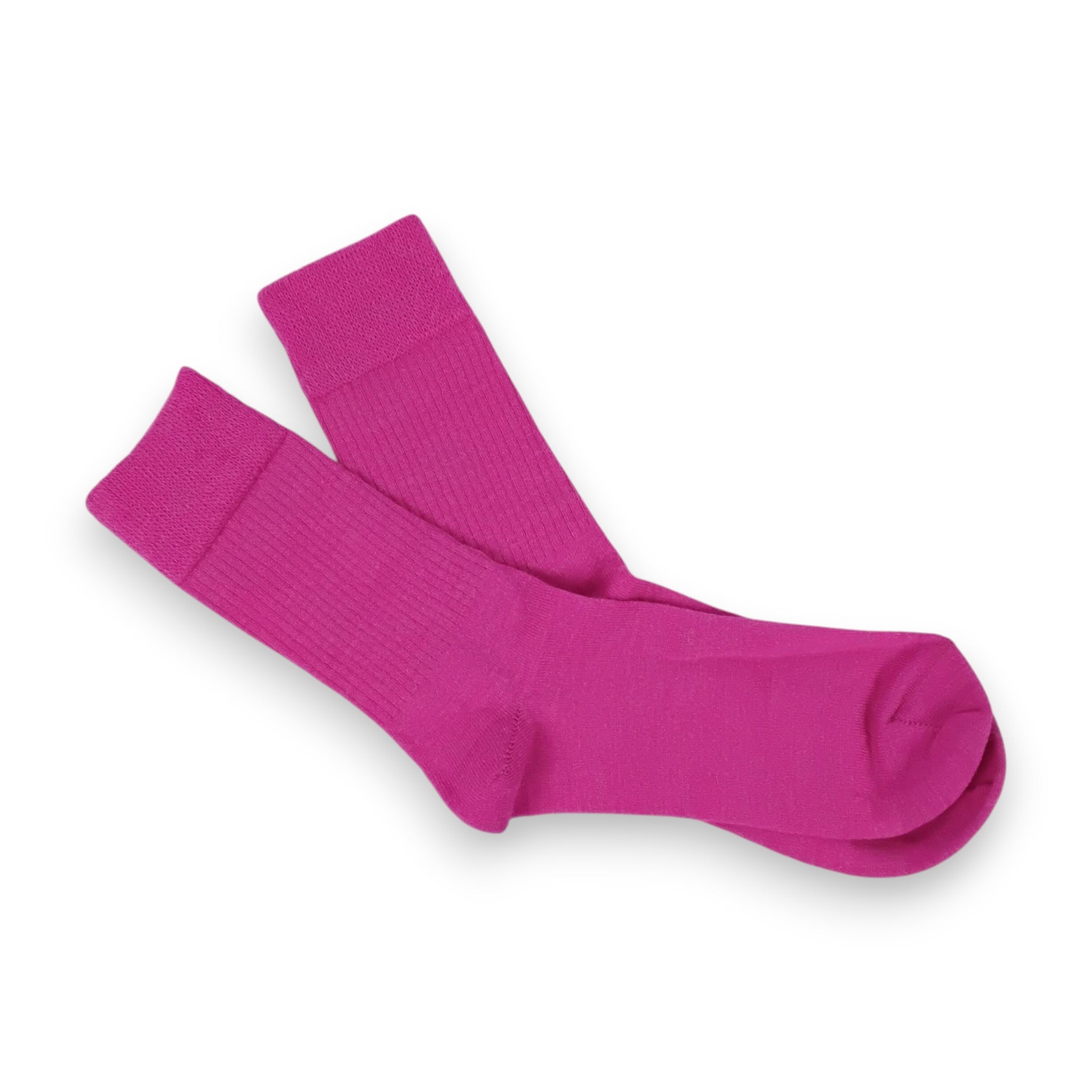 Pair of bright pink socks on a white background