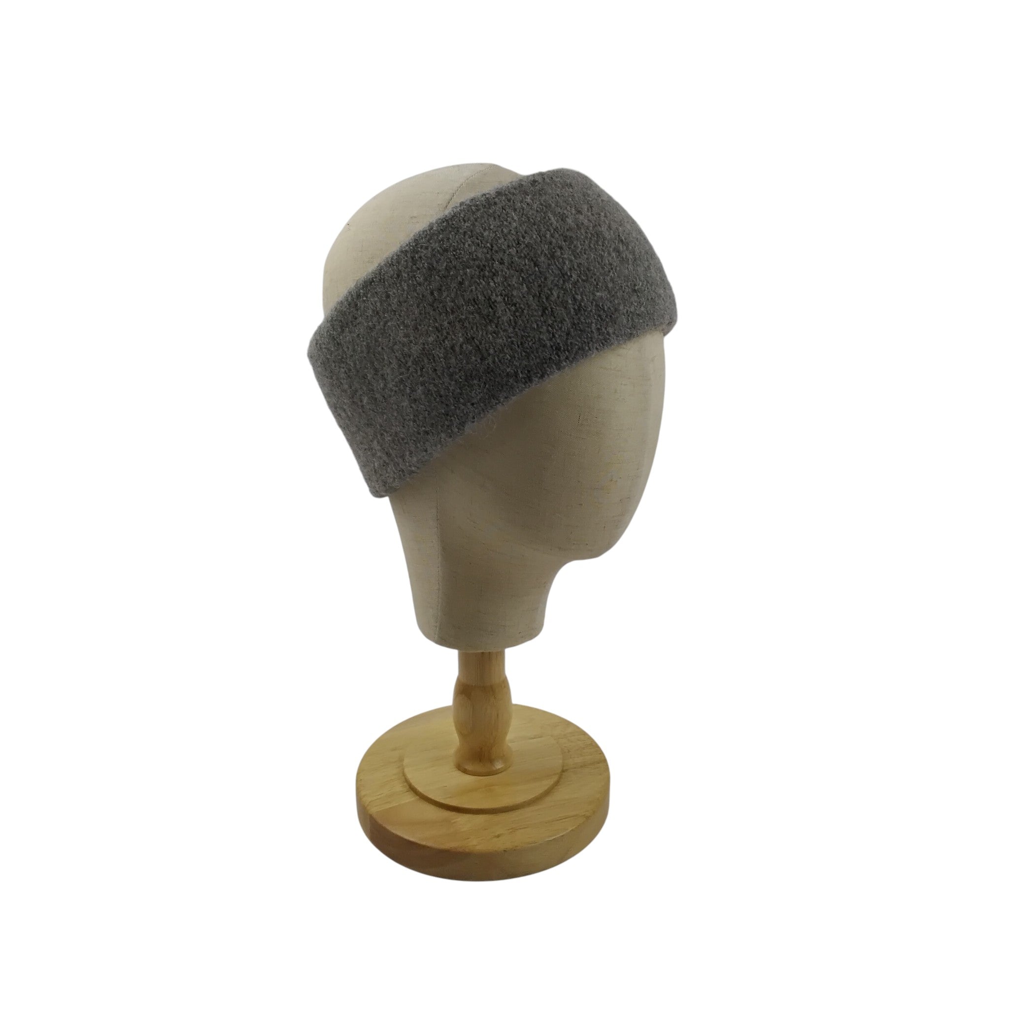 Gray headband on a mannequin head with a white background