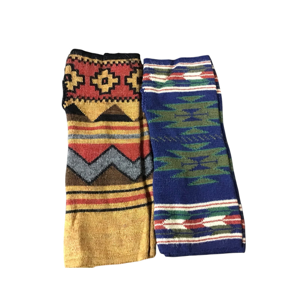 Two patterned fingerless gloves with geometric designs on a white background